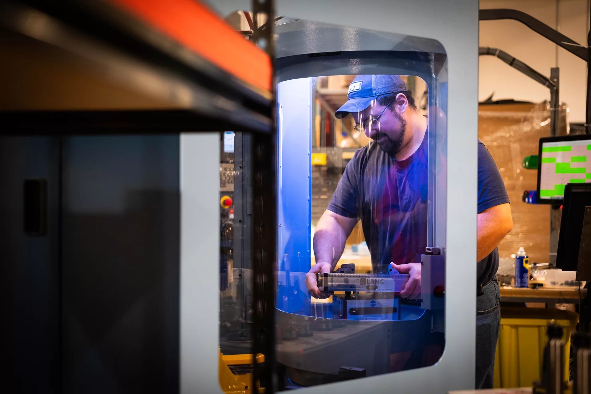 Protocase team member operating a CNC machine